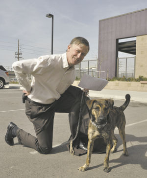 Two bill signings mark dog day at the Legislature
